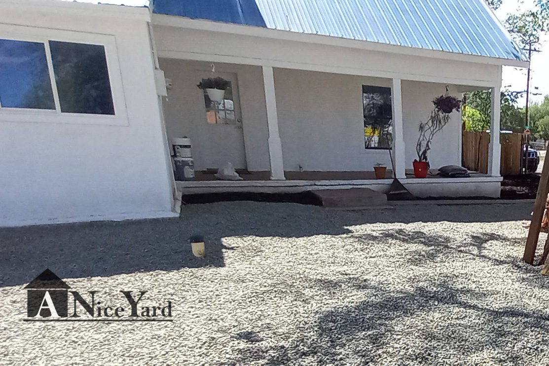 After — From cluttered and bare to a clean, welcoming front entry.