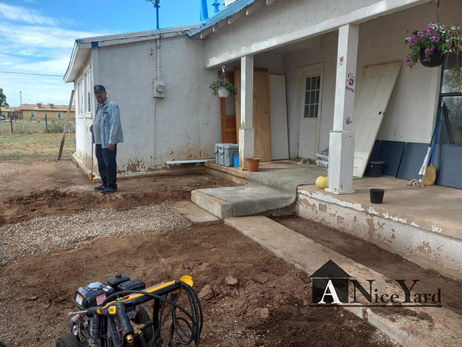 Before — From cluttered and bare to a clean, welcoming front entry.
