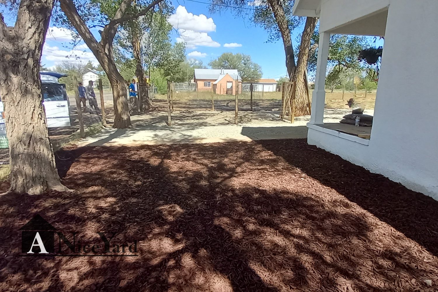 After — Raked out, hauled off, and finished with fresh mulch.